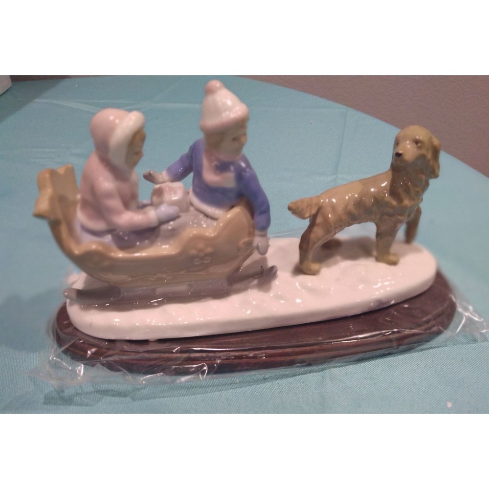 Paul Sebastian Sleigh Ride Dog & Children Porcelain Figurine